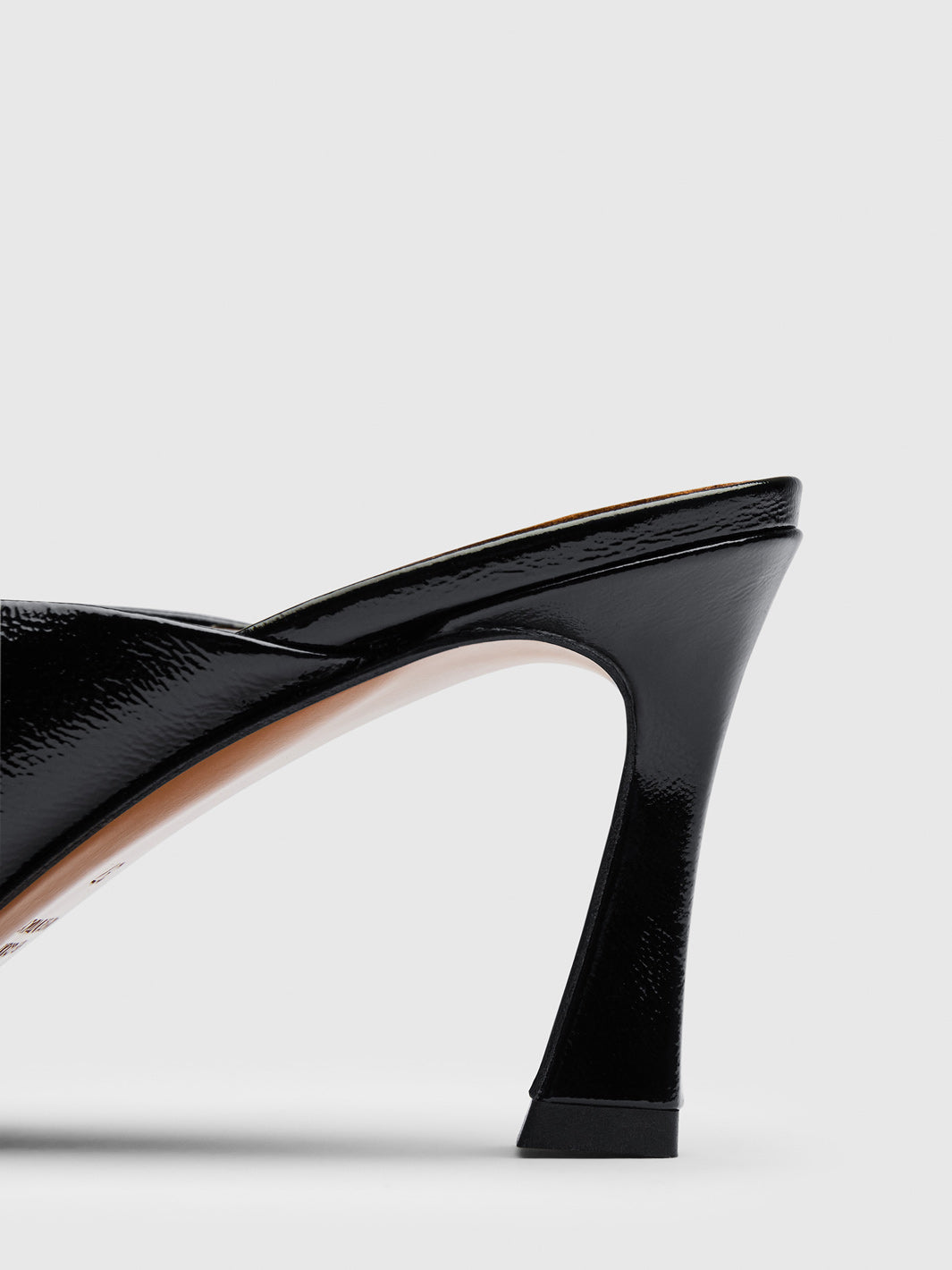 Cona Black Naplak Leather Slip-ins