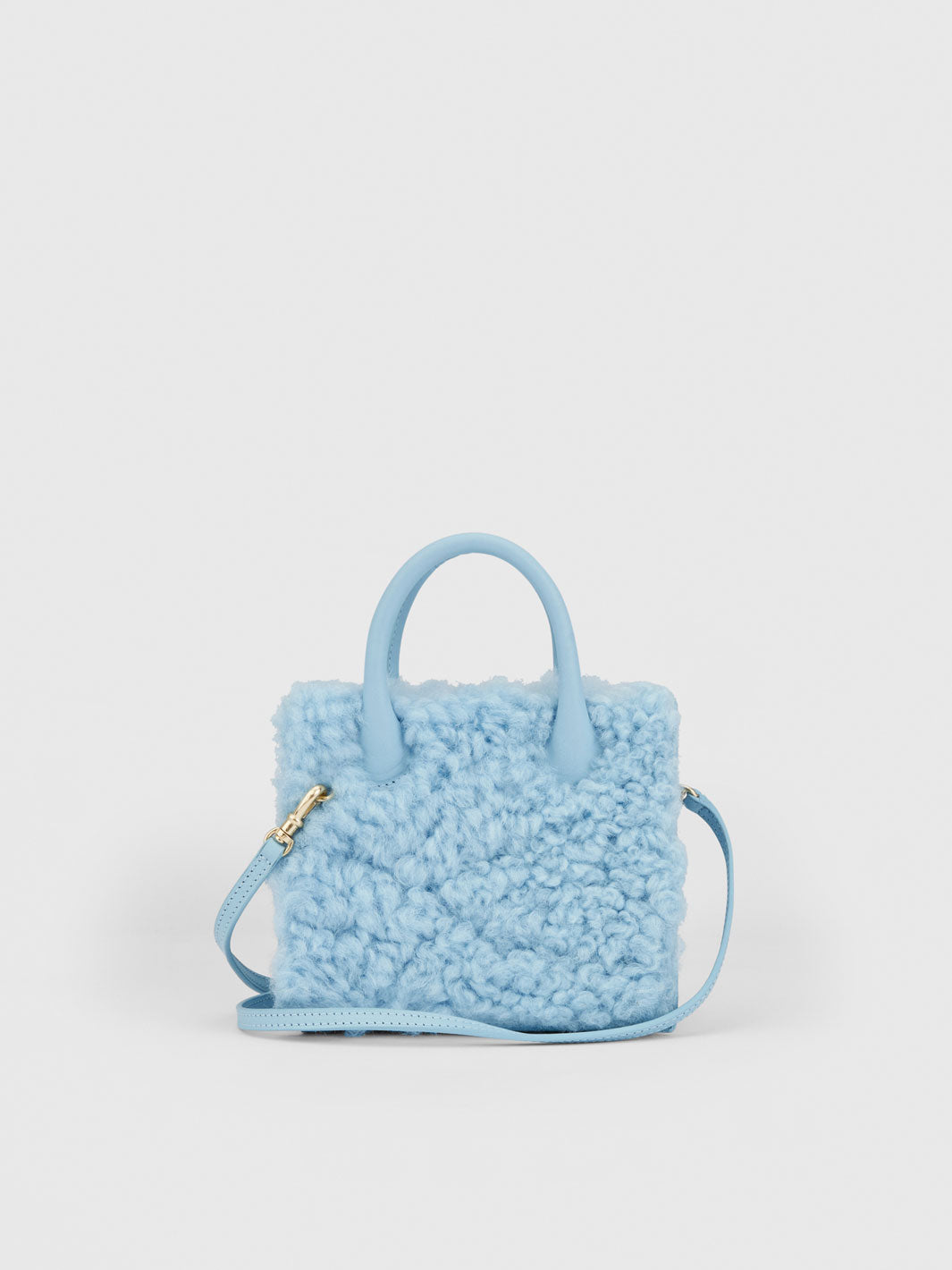 Masicelle Baby Blue Leather/Shearling Mini handbag