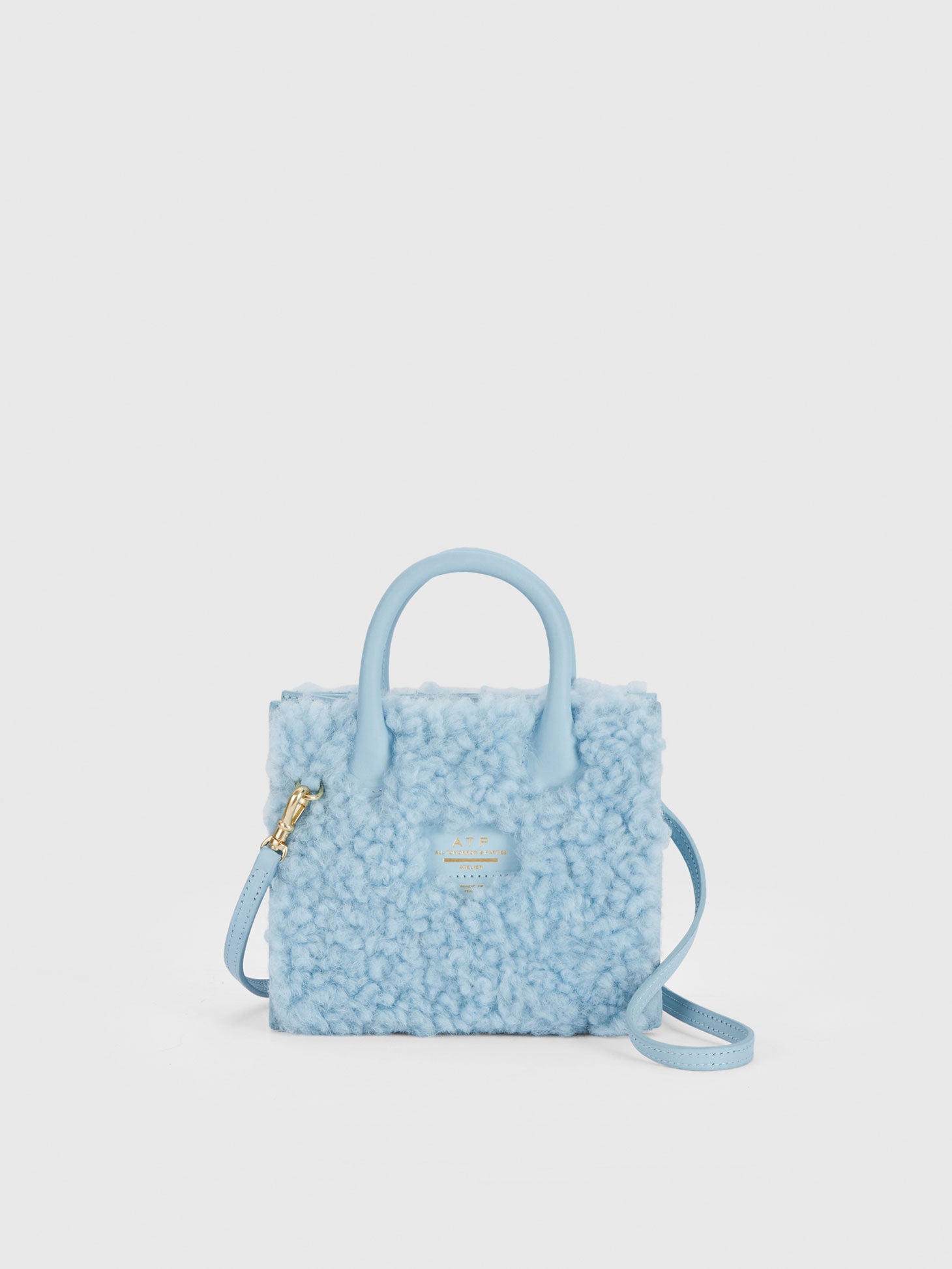 Masicelle Baby Blue Leather/Shearling Mini handbag